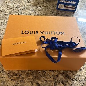 LV magnetic closure box with ribbon and wrap paper and receipt pocket